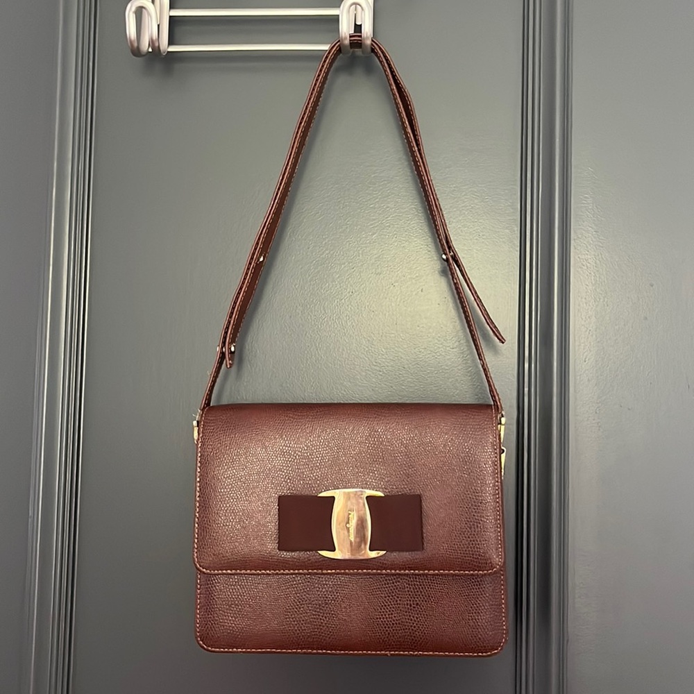 Brown lizard Ferragamo purse with adjustable shoulder strap